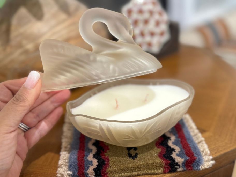 A swan shaped frosted candle from Anthropologie