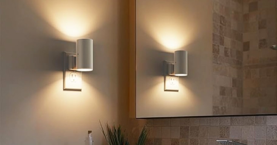 two white nightlights in bathroom