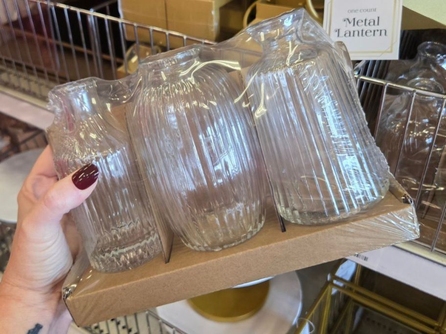 Hand holding a Ribbed Glass Vases 3-Pack from target's Bullseye's Playground
