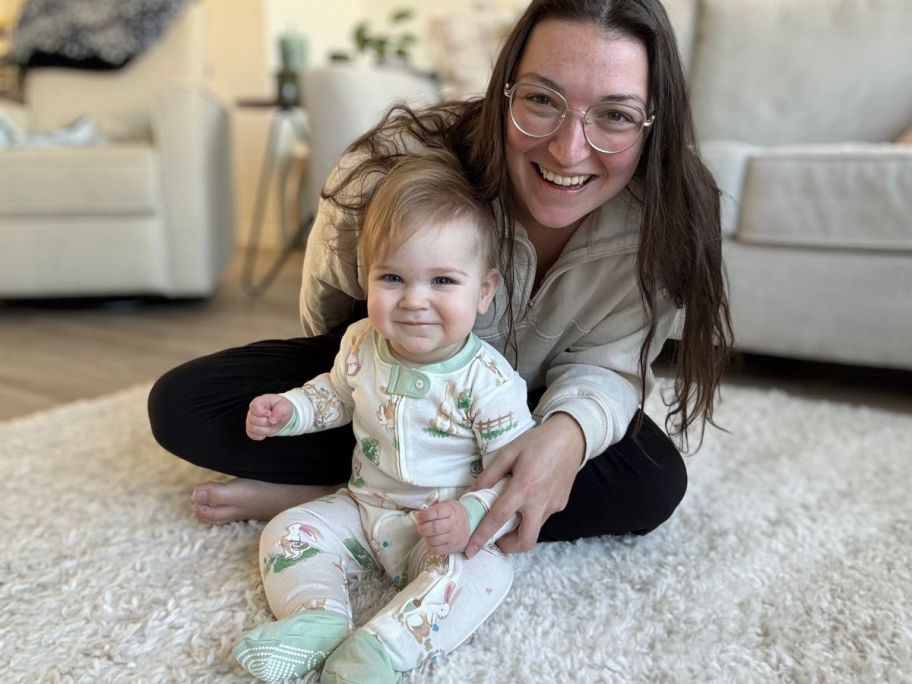 Woman with a baby wearing Burts bees baby easter pajamas