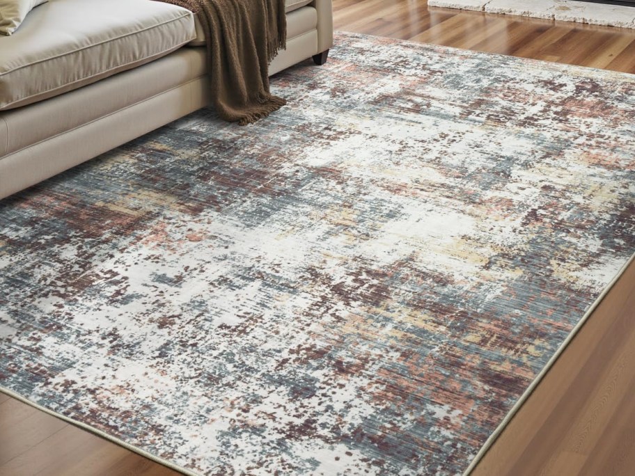 large brown and white abstract rug in living room