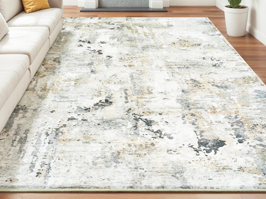 large white and grey area rug in living room