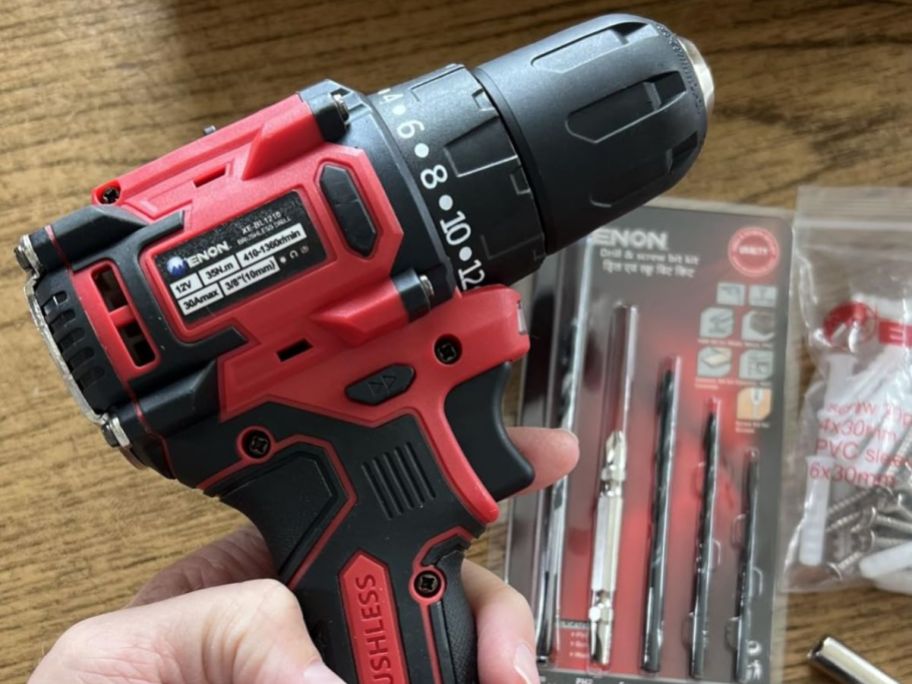 hand holding Cordless drill