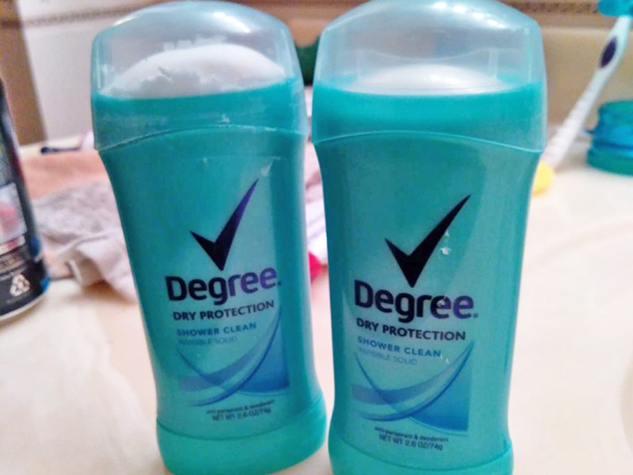 2 sticks of degree deodorant on bathroom counter