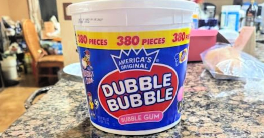 a Dubble Bubble Gum tub on a counter