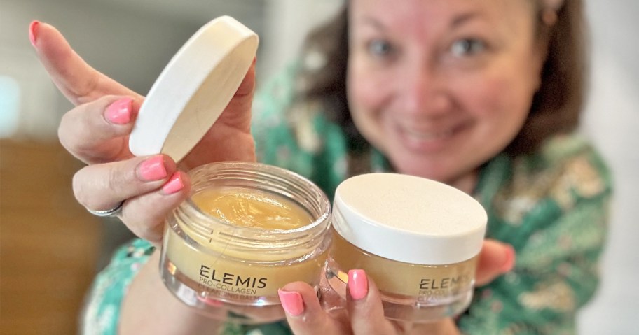 woman holding teo jars of ELEMIS Pro-Collagen Balm
