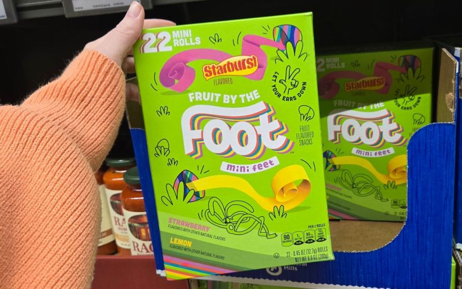 Hand holding Fruit of the foot