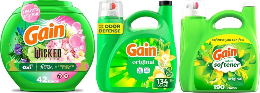 Three green bottles of Gain laundry detergent