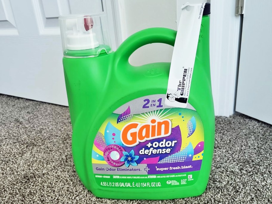 large green bottle of Gain + Odor Defense Liquid Laundry Detergent