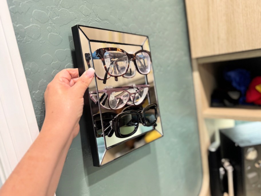 Glasses organizer made from a dollar tree mirror 