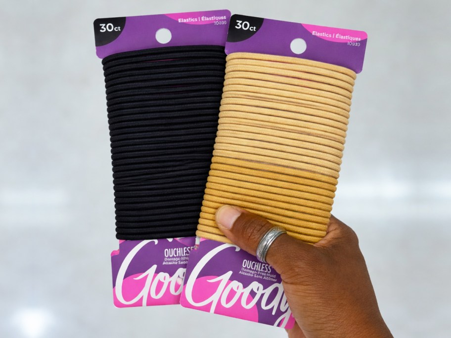 hand holding blonde and black packs of Goody Ouchless Hair Ties