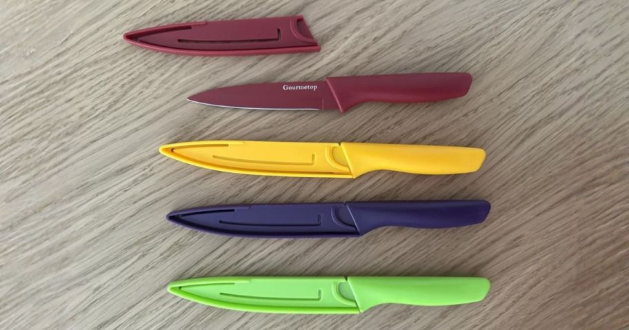 Gourmetop 4-Piece Paring Knife Set w/ Covers on table