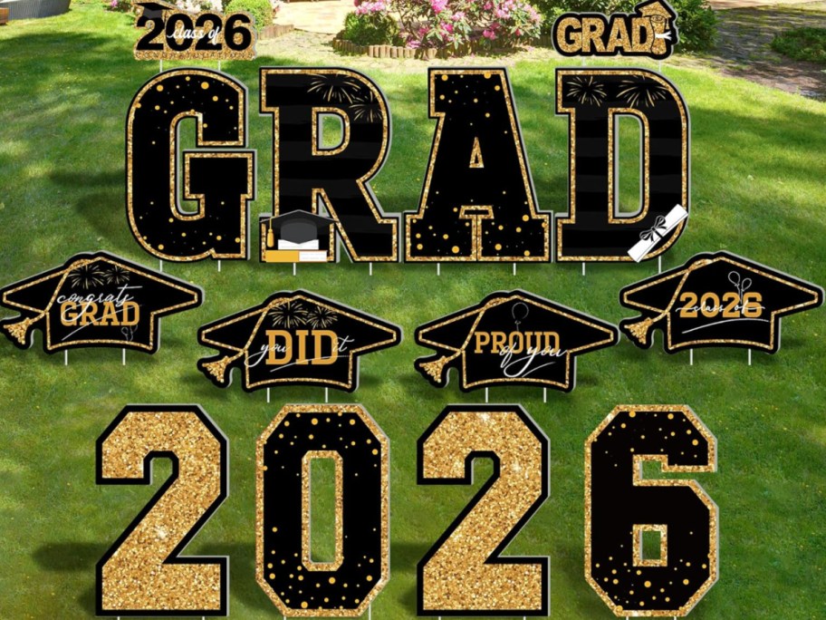 Yellow and black grad yard signs