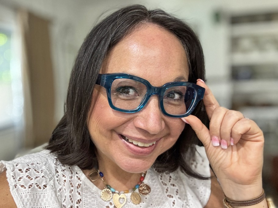 woman wearing blue glasses