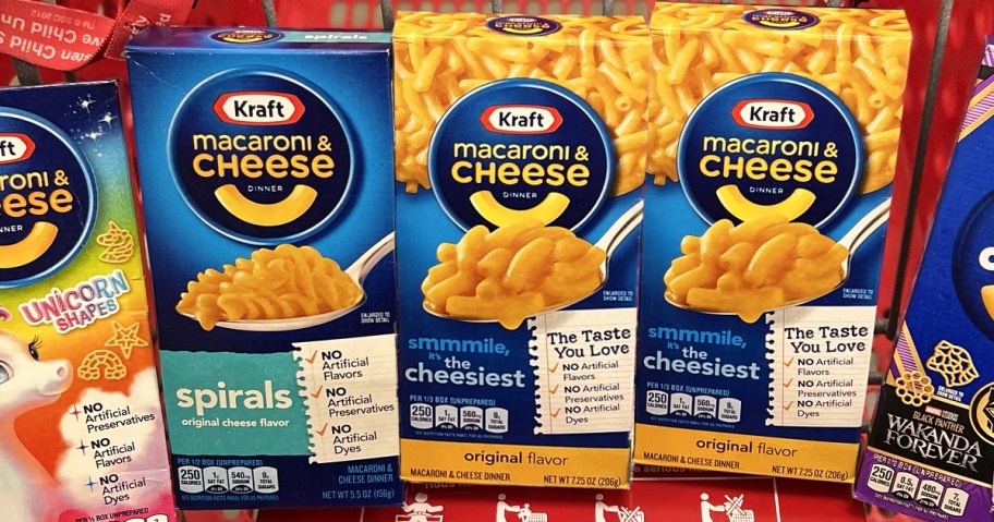 multiple boxes of Kraft Mac & Cheese in shopping cart