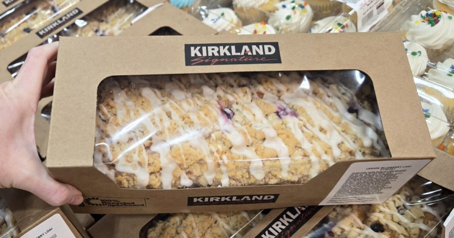 hand holding a boxed Lemon Blueberry Loaf