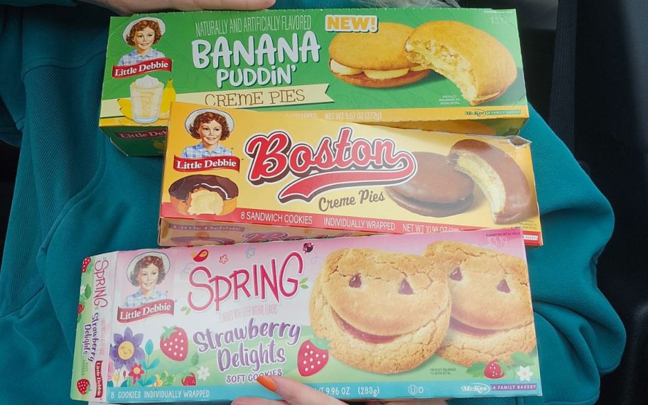 Woman holding Little debbie treats