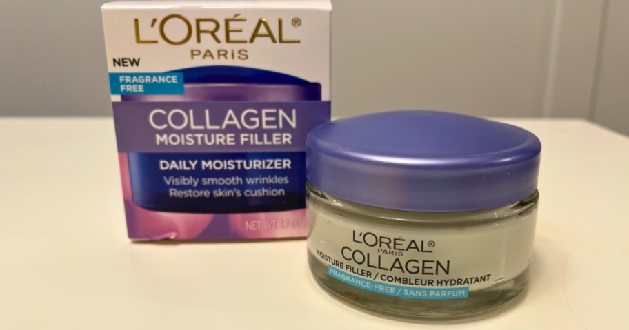 jar of L'Oreal Paris Collagen Moisture Filler Moisturizer 1.7oz on table with box