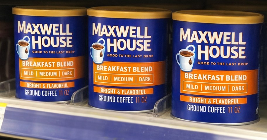 Canisters of Maxwell House on store shelf