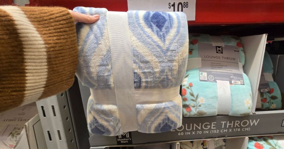Mia Geo throw blanket in hand in store