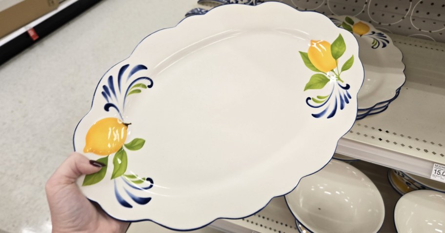 hand holding a lemon print serving tray