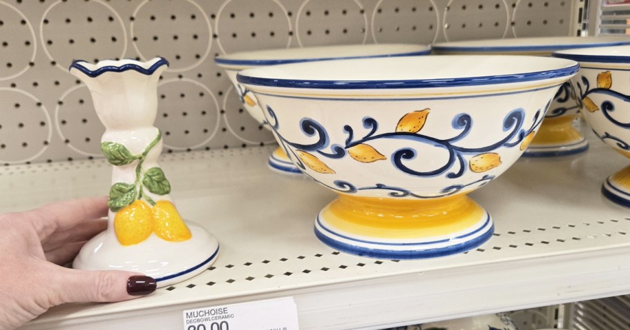 lemon print candle holder and bowl on store shelf