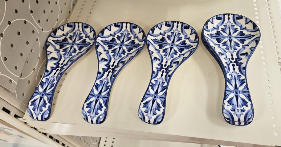 blue and white spoon rests on store shelf