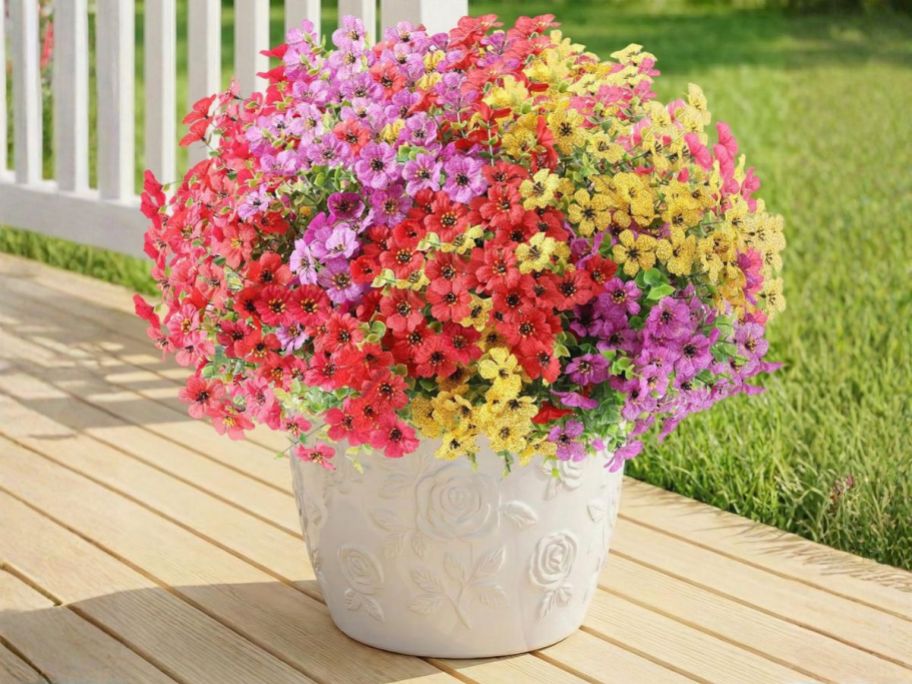mixed Outdoor Artificial Flowers in pot on porch