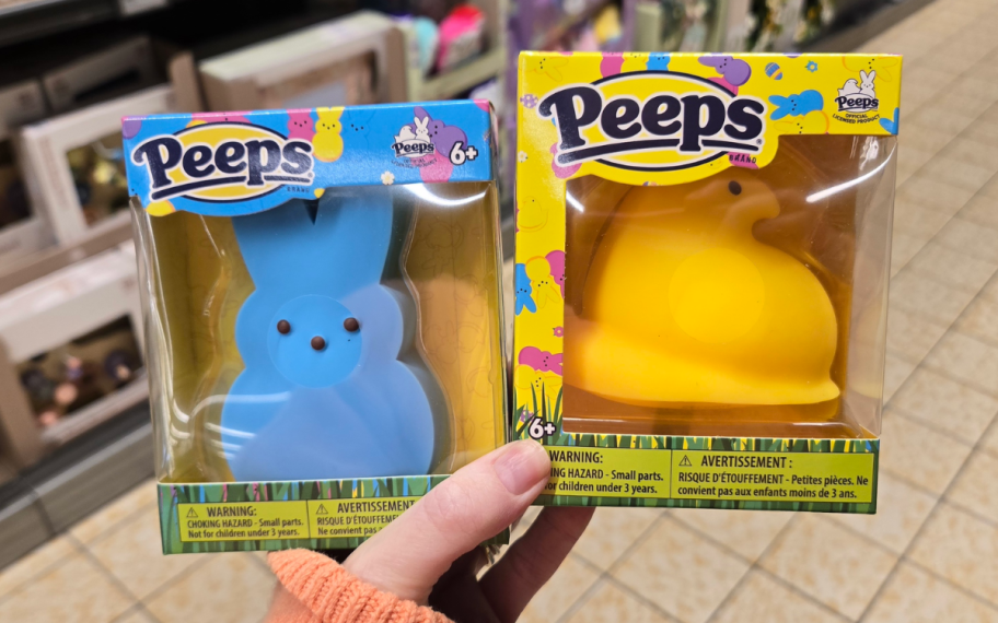 Hand holding peeps toys