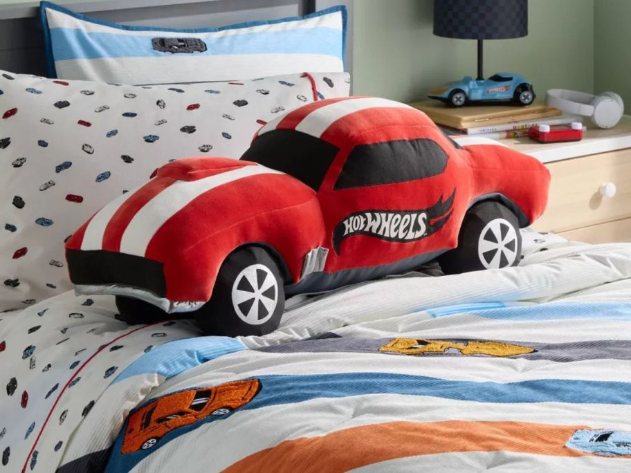 Pillowfort Hot Wheels Retro Jumbo Car Weighted Plush Kids' Throw Pillow on bed