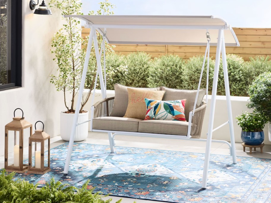 white porch swing with canopy