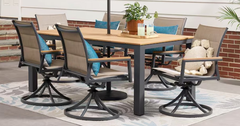 patio dining set with wood table and 6 swivel chairs