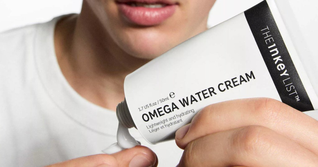 man squirting The INKEY List Omega Water Cream Oil-Free Moisturizer