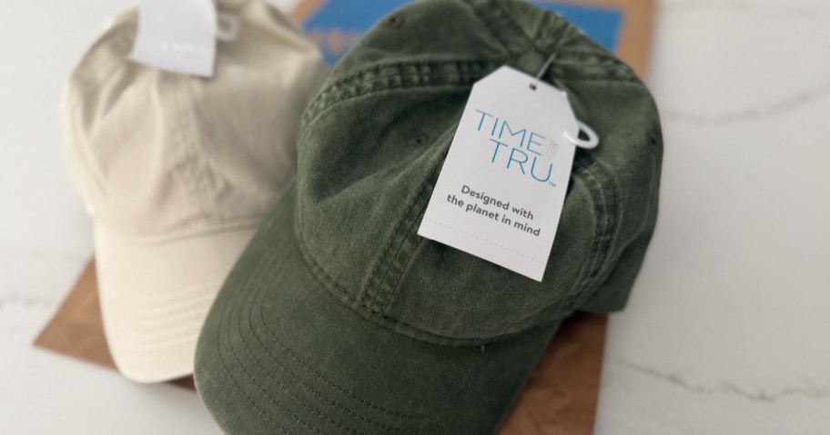 Green and cream color, baseball hats with time and tru store tags