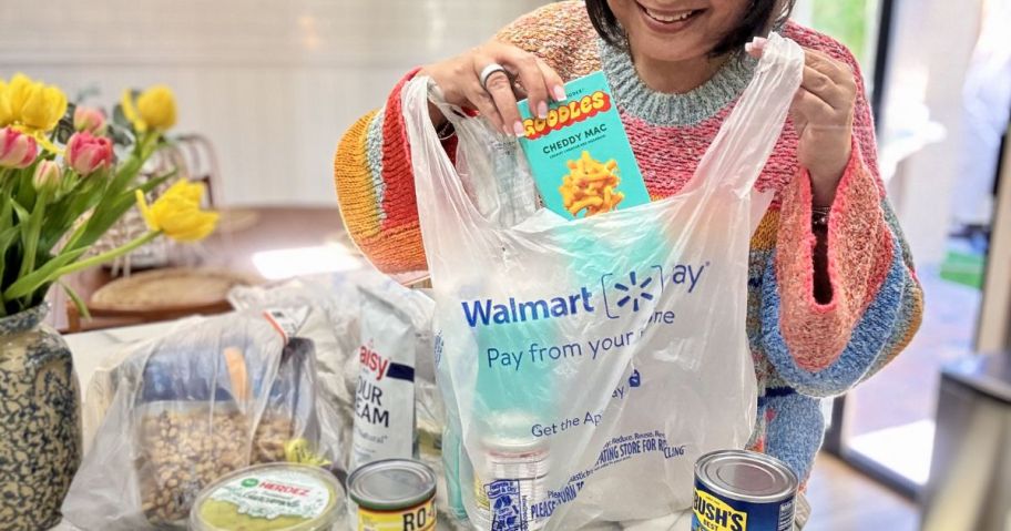 Woman taking items out of a Walmart Delivery Order