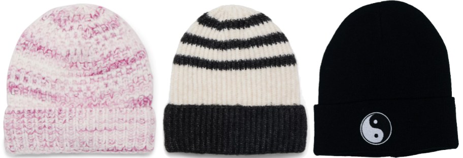pink, white, and black beanies in a row
