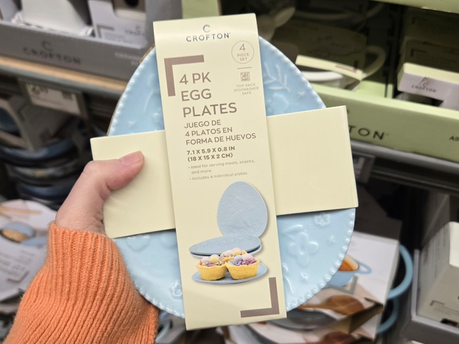 hand holding blue egg plate