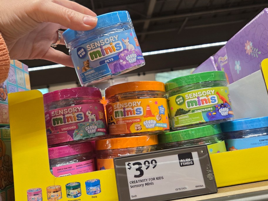 hand reaching for mini sensory minis