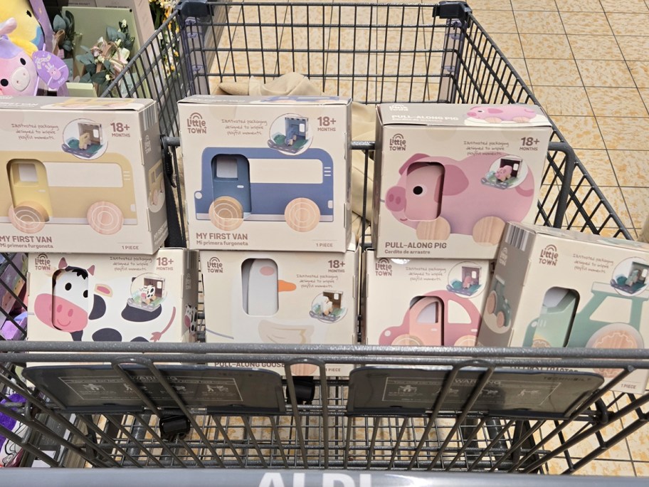 Shopping cart filled with wooden toys 