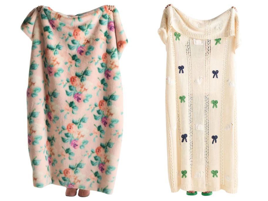 two people holding anthropologie blankets