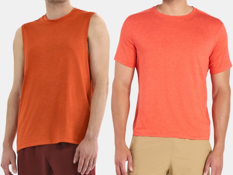 Two men wearing orange tops: one in a sleeveless shirt and maroon shorts, the other in a short-sleeved tee with beige pants.