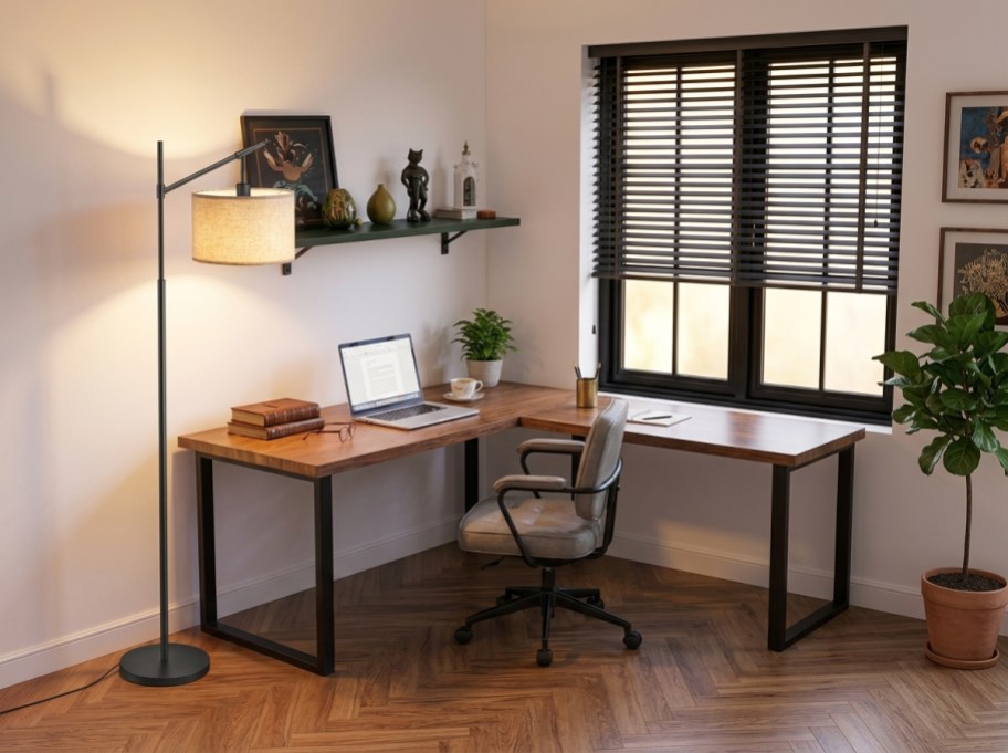 floor lamp by a desk in a home office