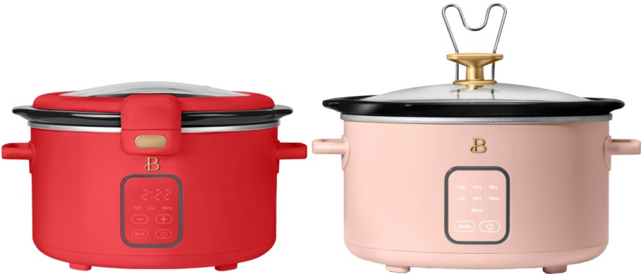 Two modern slow cookers side by side; one is red with a digital display and the other is pink with a decorative lid handle.