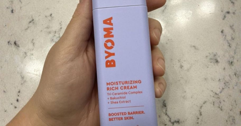 hand holding byoma Moisturizing Rich Cream