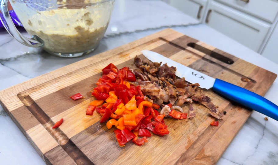 chopping bacon and bell peppers