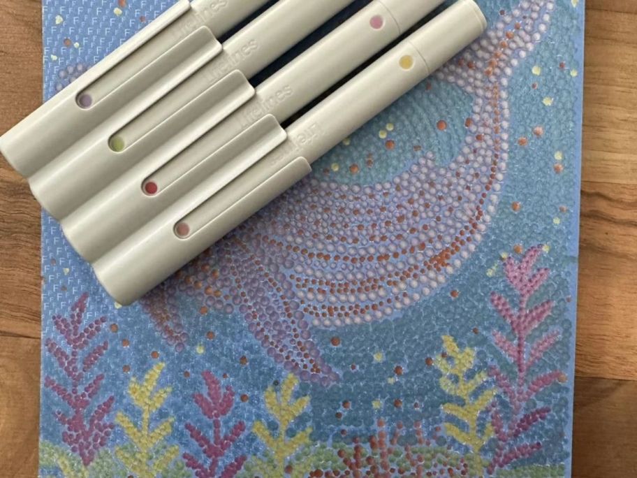 color by dots with pens on top 