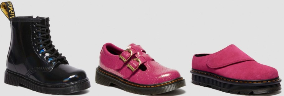 A row of three shoes against a plain background: a shiny black combat boot, a glittery pink shoe with buckles, and a plain pink slip-on.