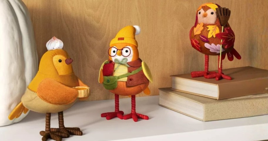three fall-themed decorative Birds