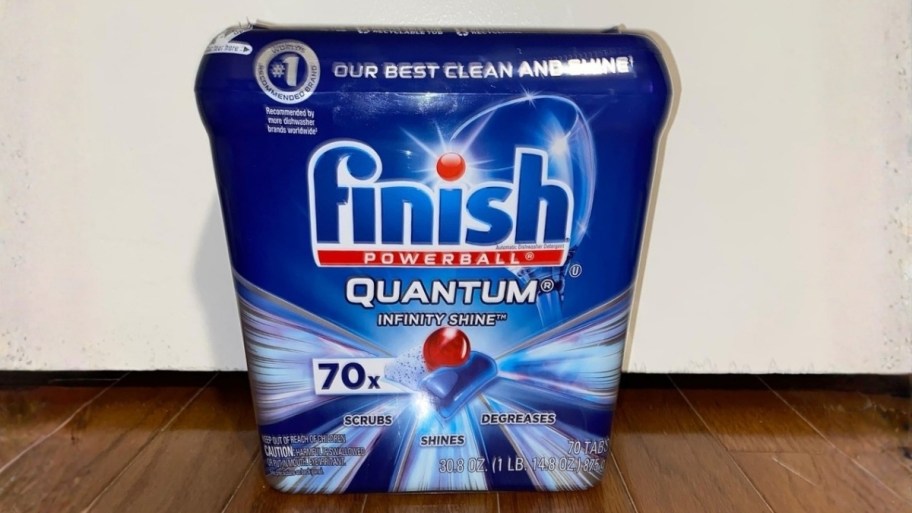 finish quantum infinity shine dishwasher pods container on a hardwood floor