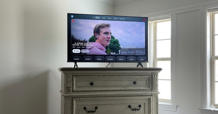 tv on top of a dresser